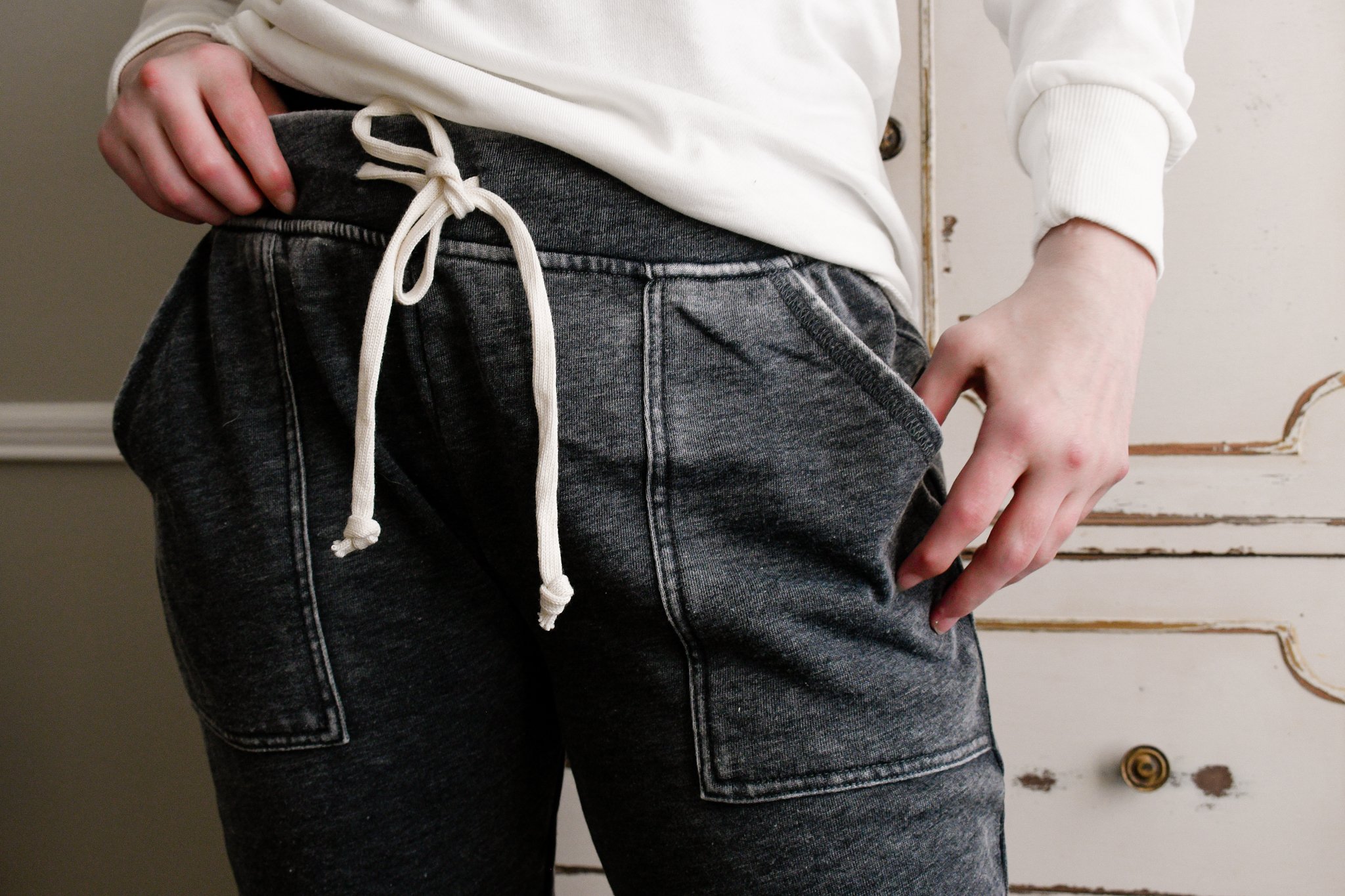Alternative Apparel joggers, close up of tied waist band and pockets 