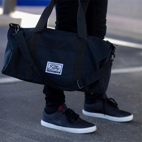 Black bag with large flithy casual hem tag 