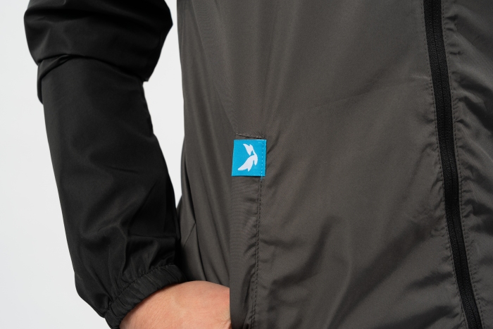 Threadbird hem tag attached to the ITC windbreaker