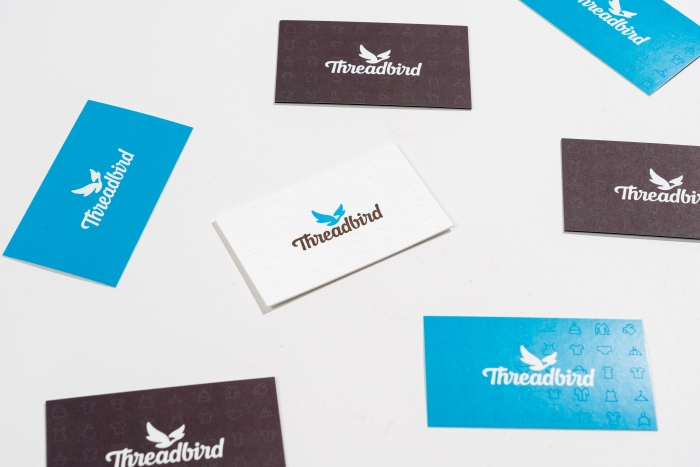 Flat lay of Threadbird business cards