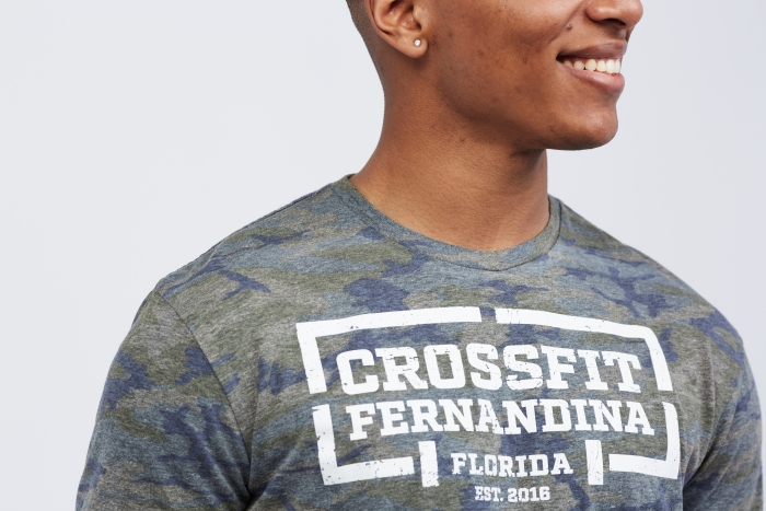 Close up of camo t-shirt with Crossfit Fernandina 'Florida' text printed in white ink 