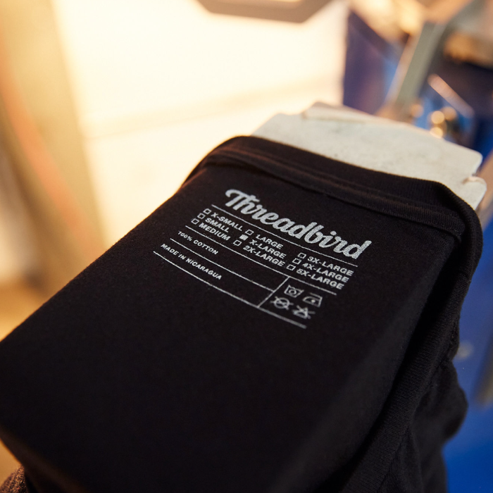 Enhance Your Brand with Custom Apparel Labels & Finishings / A Threadbird Blog