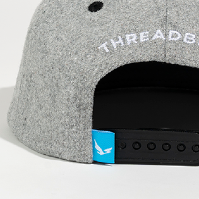 Enhance Your Brand with Custom Apparel Labels & Finishings / A Threadbird Blog